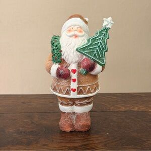 Festive Gingerbread Santa Claus Figurine with Green Tree